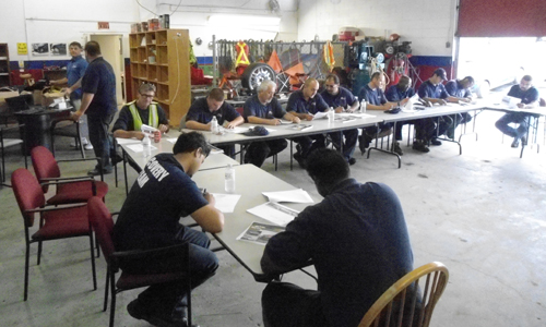 A training program in session. Training at Abram’s towing covers a number of essentials including safety training, Wreckmaster Certification, first aid, and customer service training to name a few.